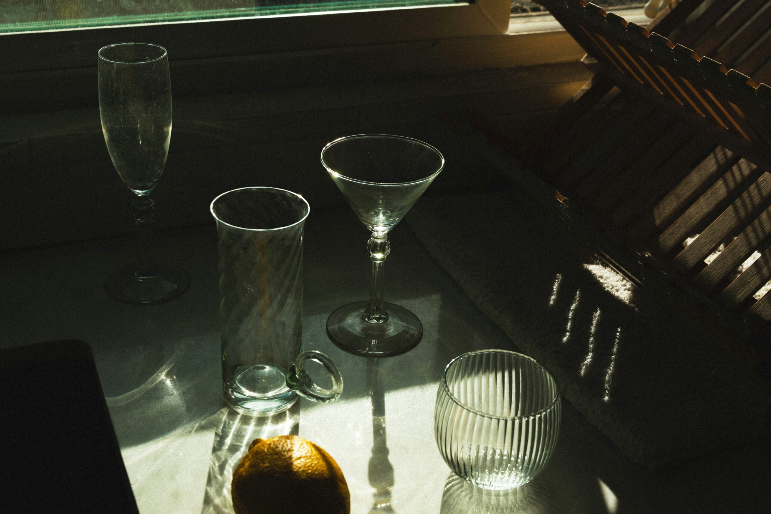 Gamer drinking water next to their setup