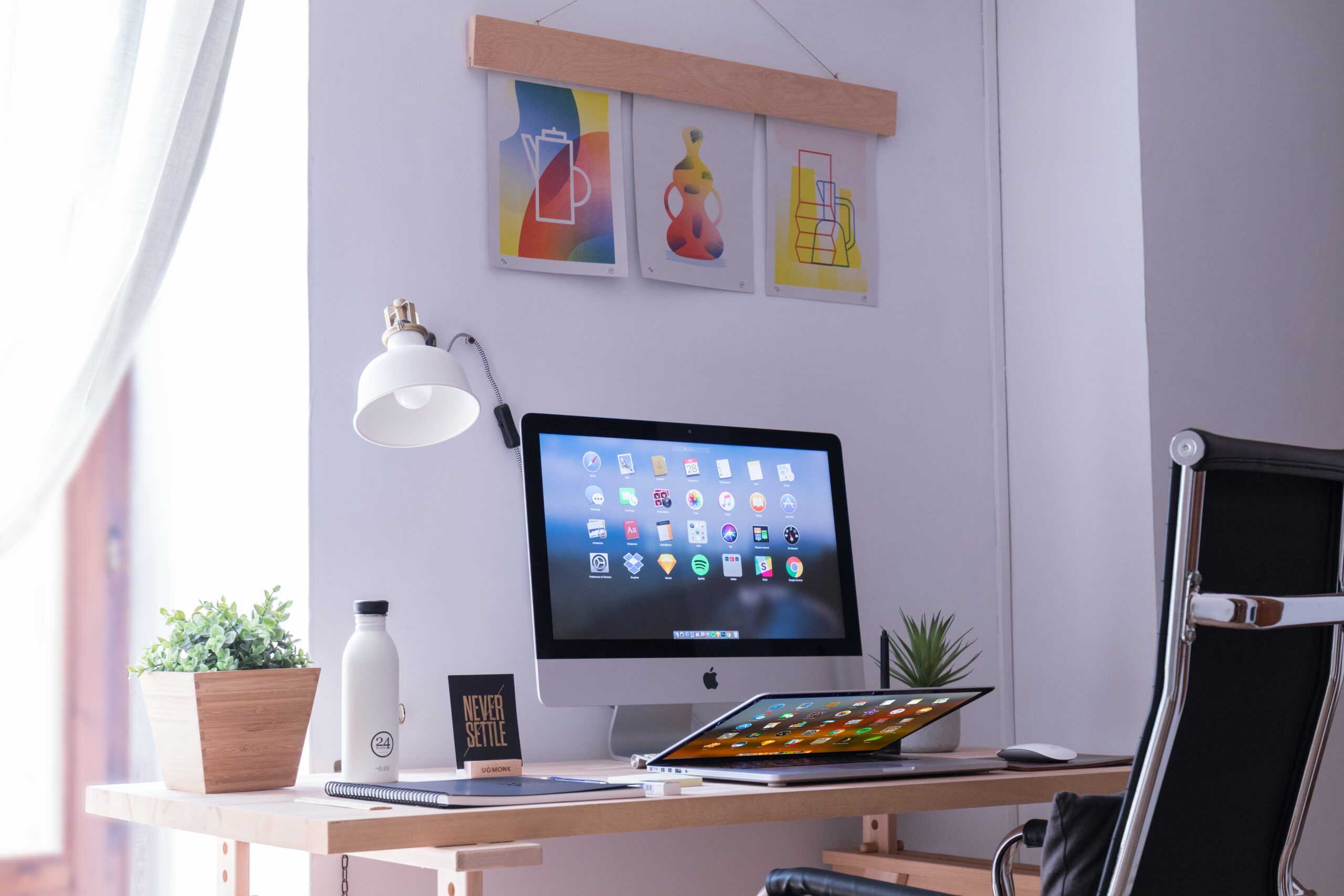A gamer sitting at a desk surrounded by various healthy snacks like nuts and fruit slices